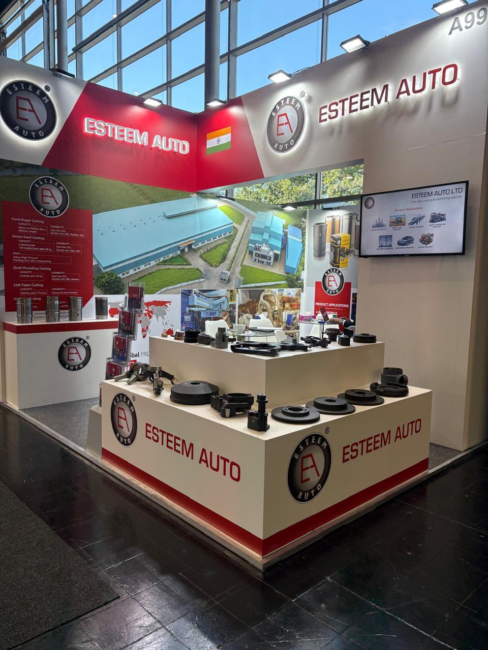 Esteem Auto liners on display at a trade show stand