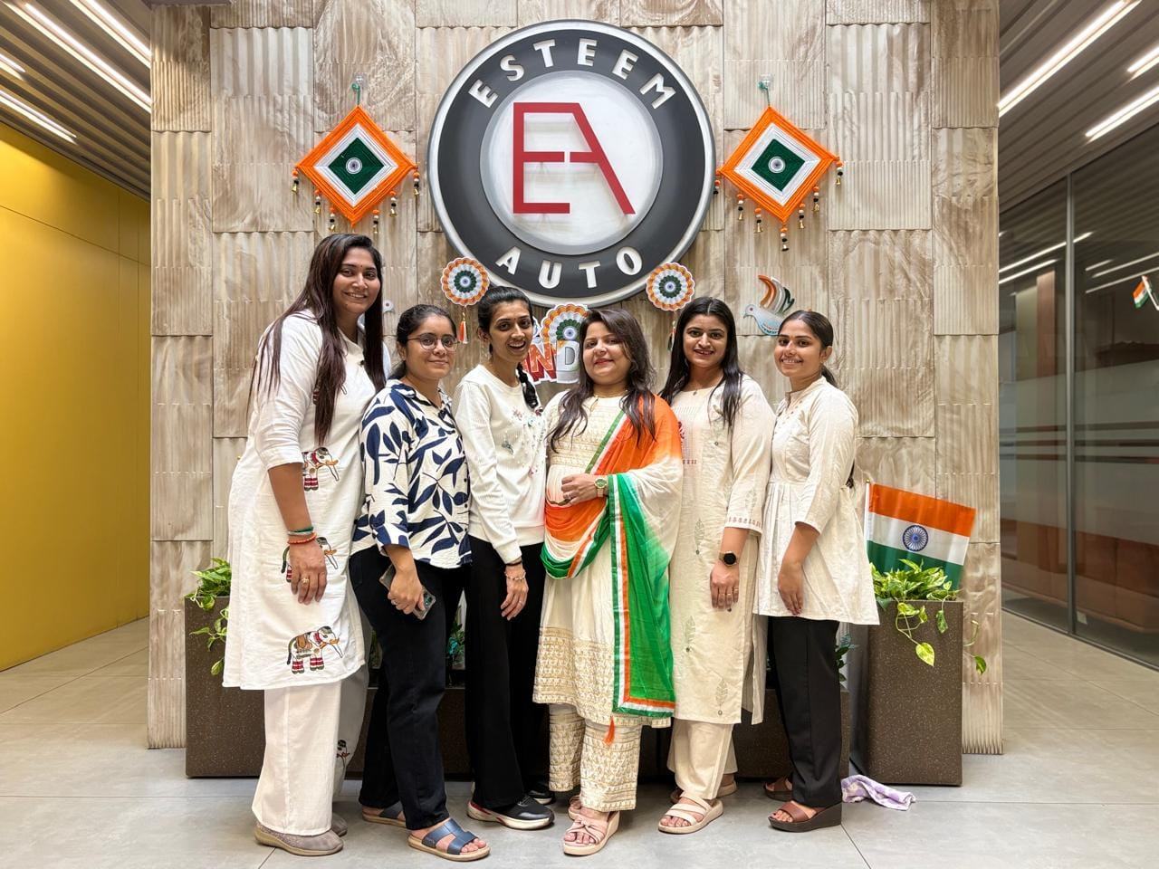 Members of the Esteem Auto office team